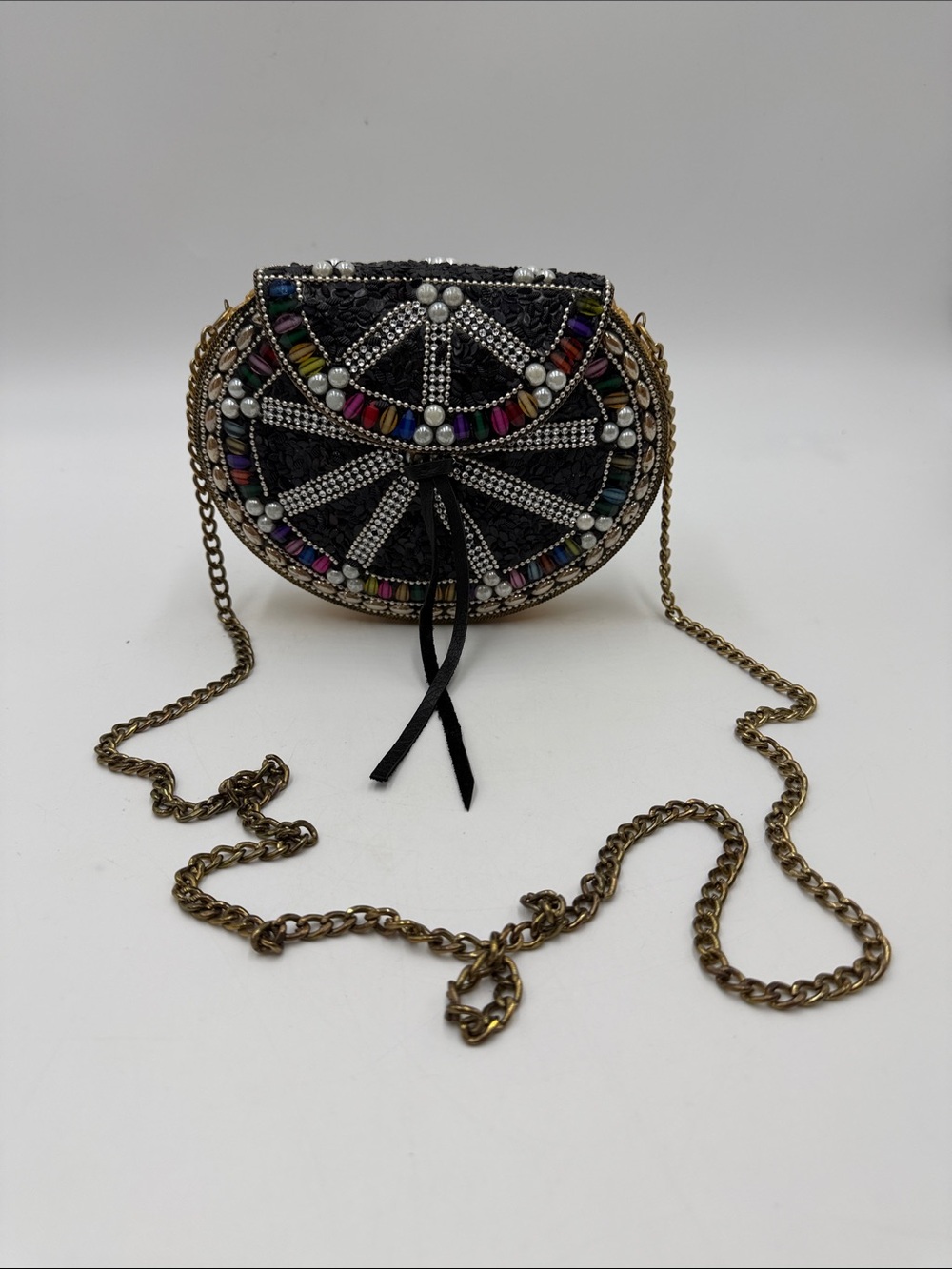 Lulu NYC beaded iron box crossbody bag featuring a black mosaic design